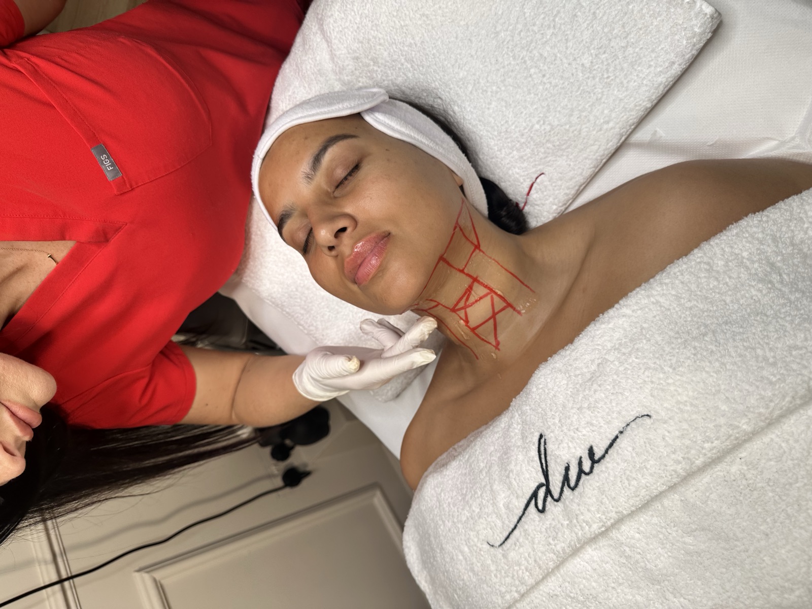 Danielle treating a client at DW Aesthetics